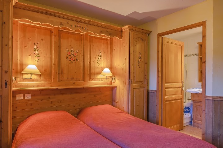 חדר שינה במלון Les Balcons